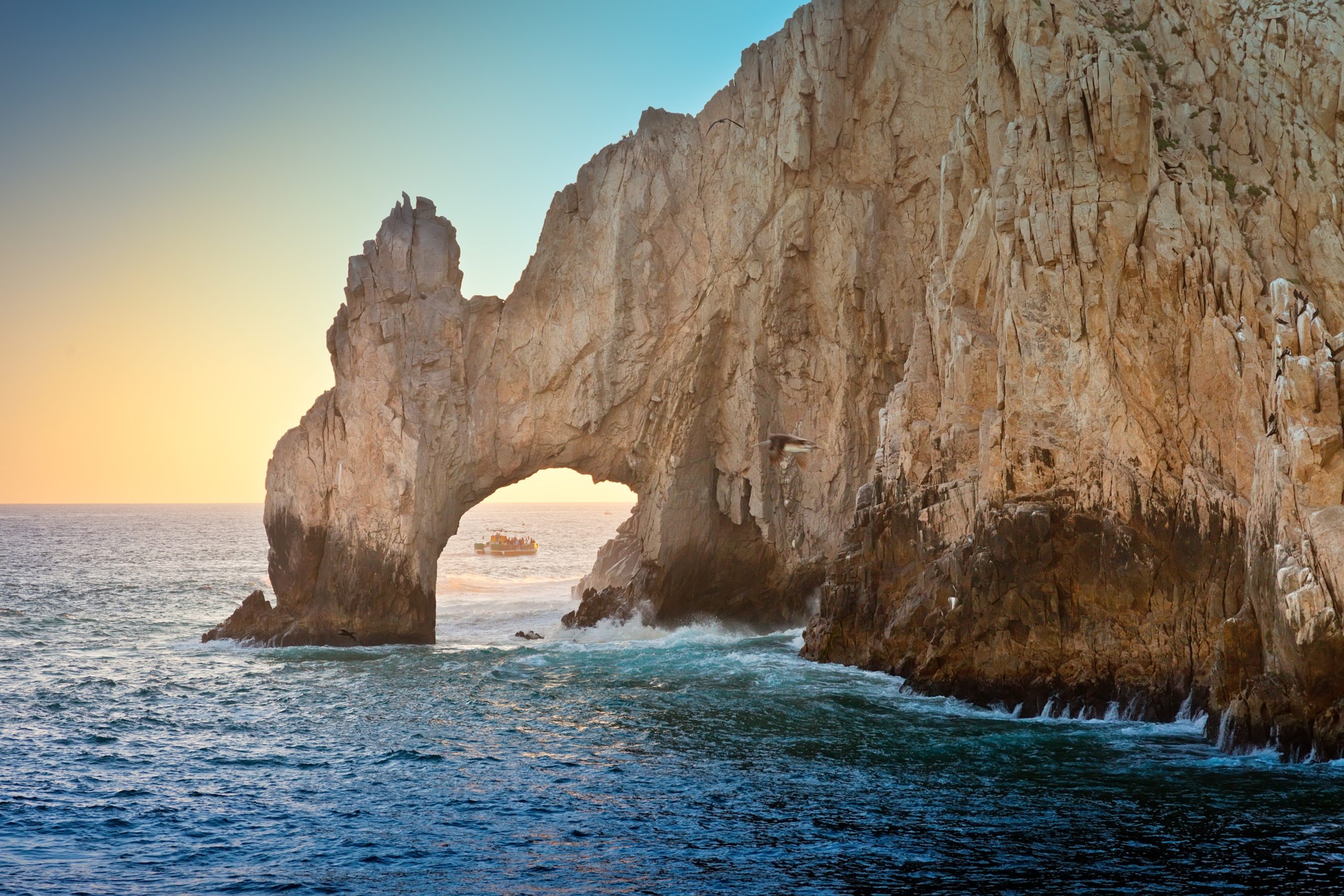 21263559 - the natural rock formation called the arch in cabo san lucas, mexico