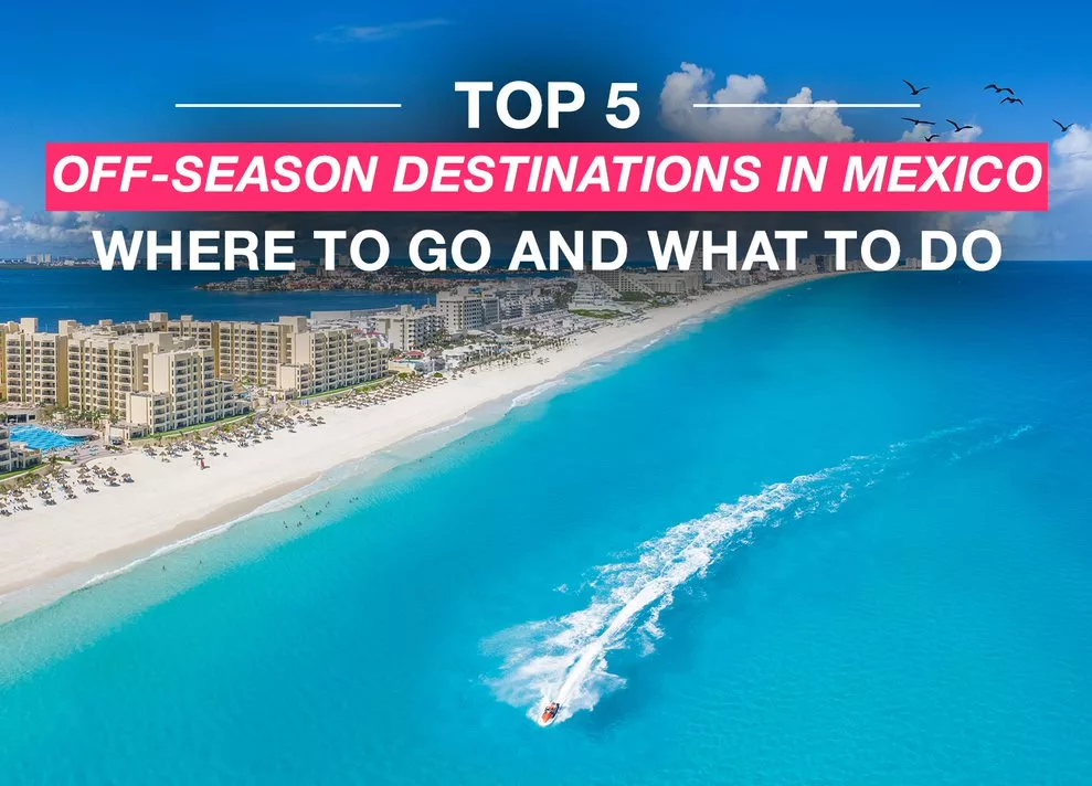 a boat driving off the bright blue shore of riviera maya, mexico